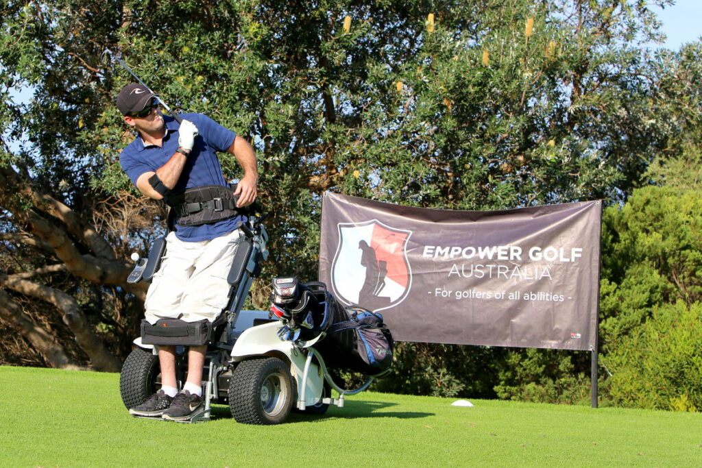 Inclusive Golf Tournament – Long Reef Golf Club, Empower Golf article, photo of Nick Taylor in front of Empower Golf sign